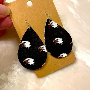 Cut leather earrings with eagle print. 🦅
